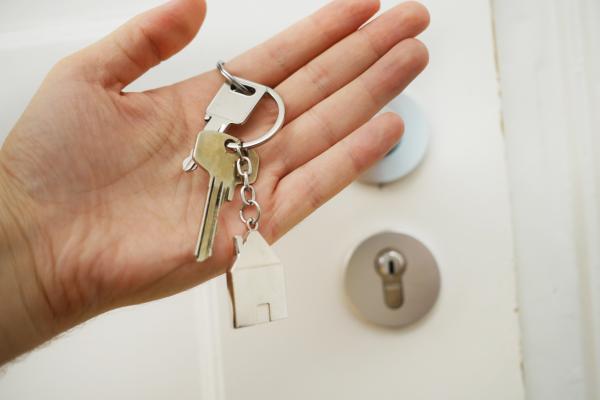 a person holding a set of keys